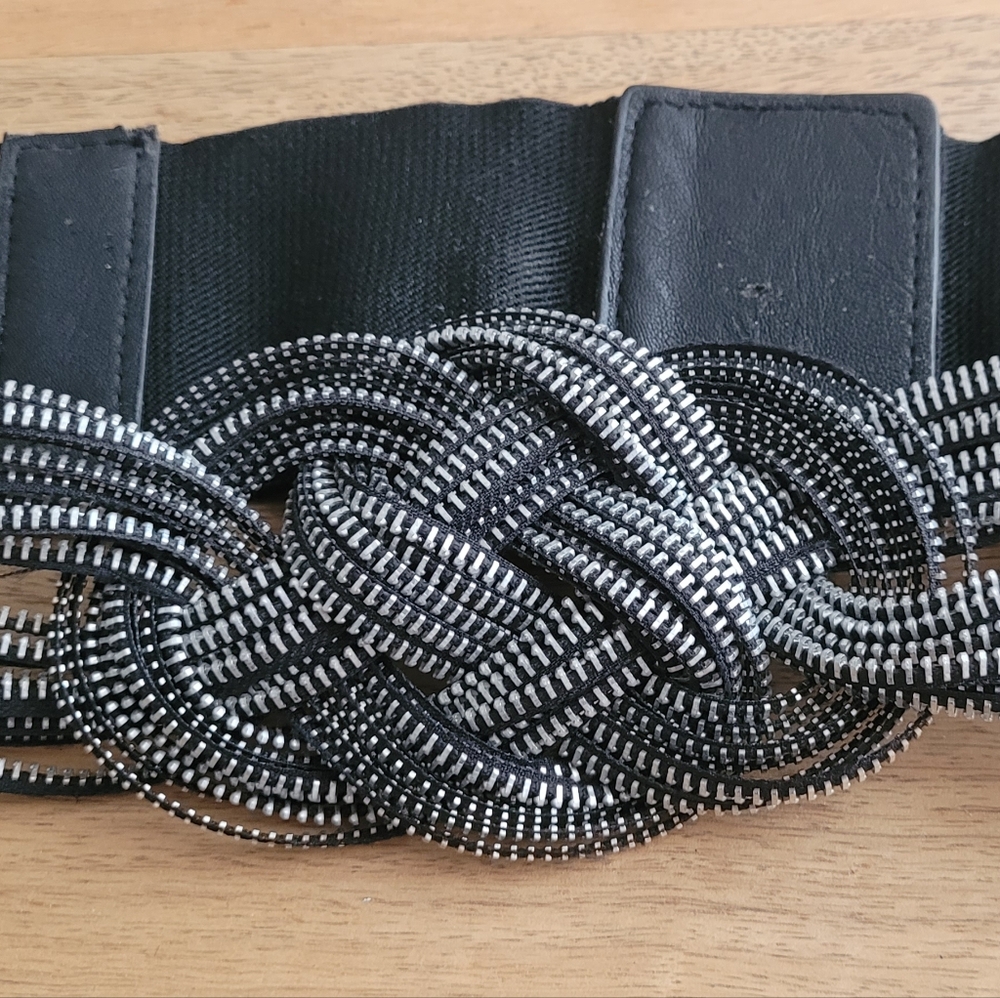 Belt with metal decorations small to medium size waist, velcro closing